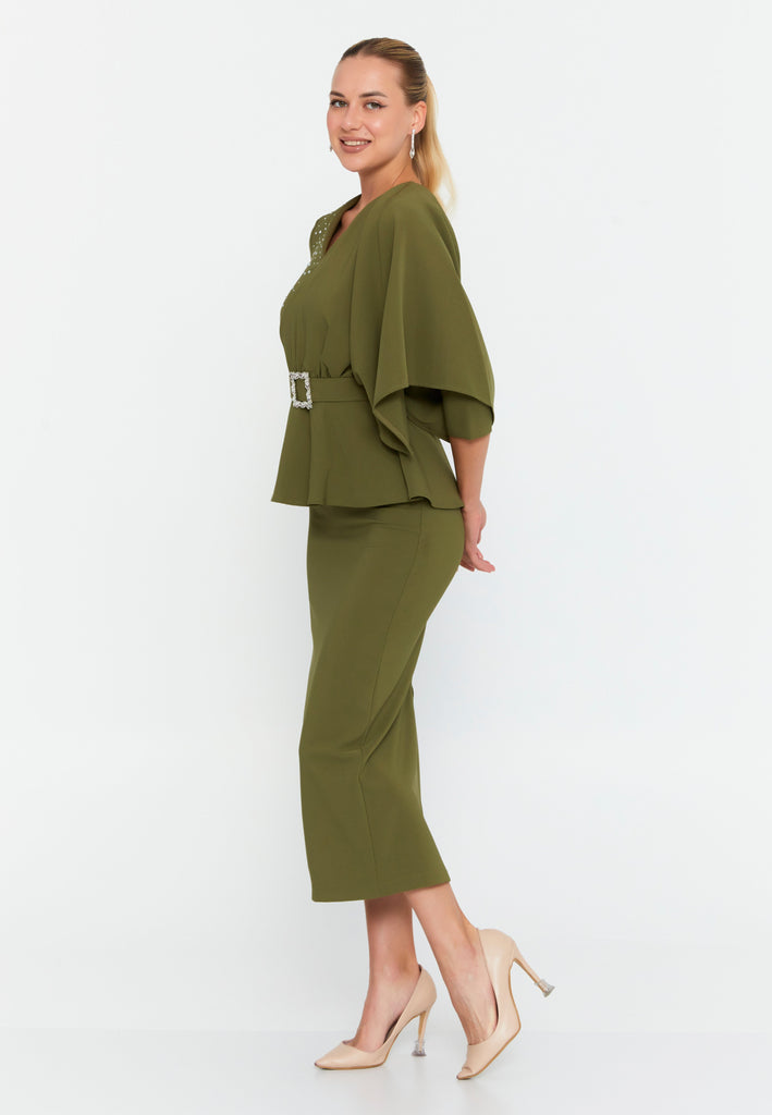 Asymmetric Draped-Sleeve V-Neck Dress – Crystal-Stud Panel, Jeweled Square-Buckle Belt & Peplum Waist over Sleek Column Skirt