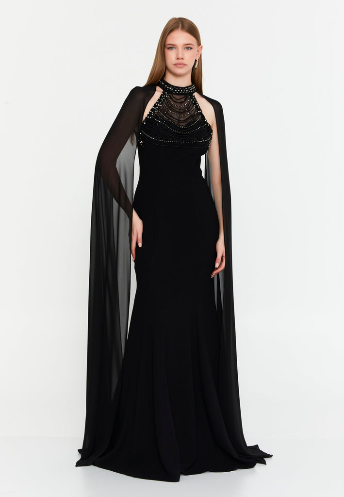 High-Neck Beaded Cape Gown – Cascading Jewel Drape, Sheer Flowing Sleeves & Sculpted Mermaid Silhouette