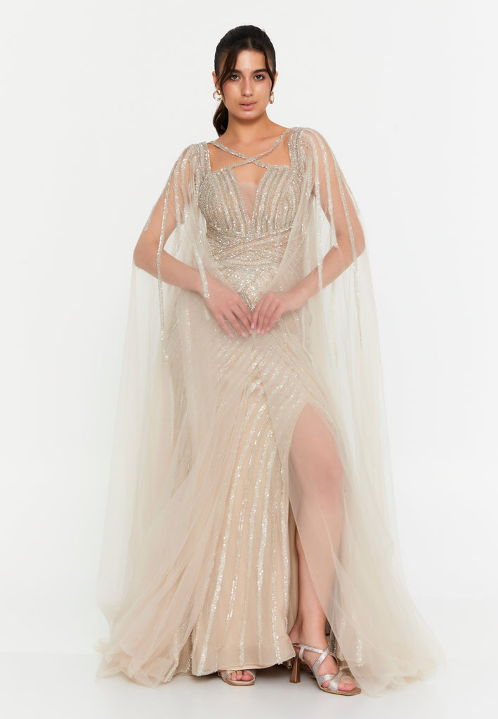 Celestial Beaded Cape-Sleeve Gown – Crisscross Neckline, Off-Shoulder Bodice, Front Slit & Flowing Tulle Trains