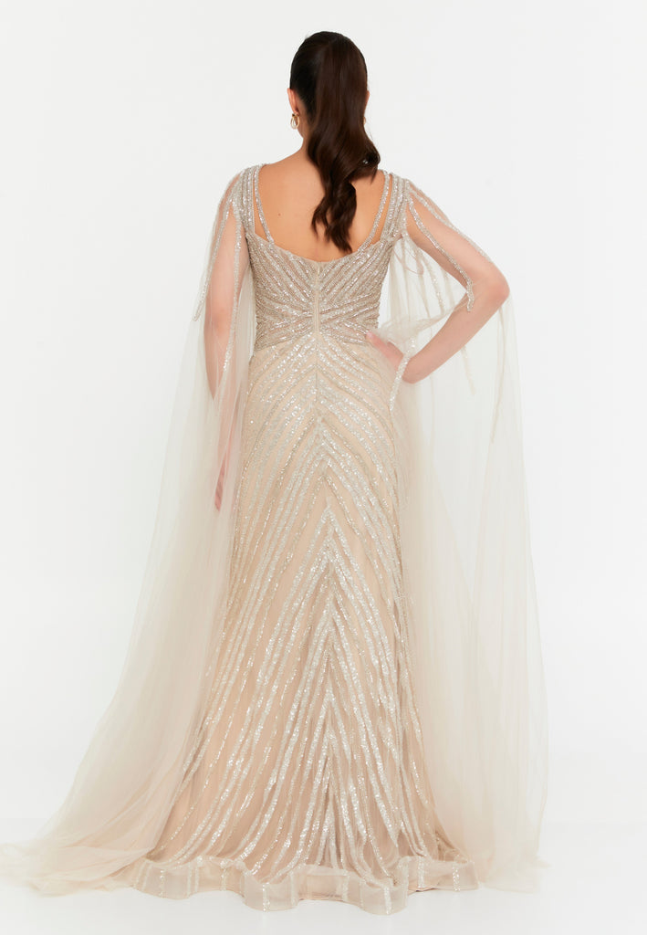 Celestial Beaded Cape-Sleeve Gown – Crisscross Neckline, Off-Shoulder Bodice, Front Slit & Flowing Tulle Trains