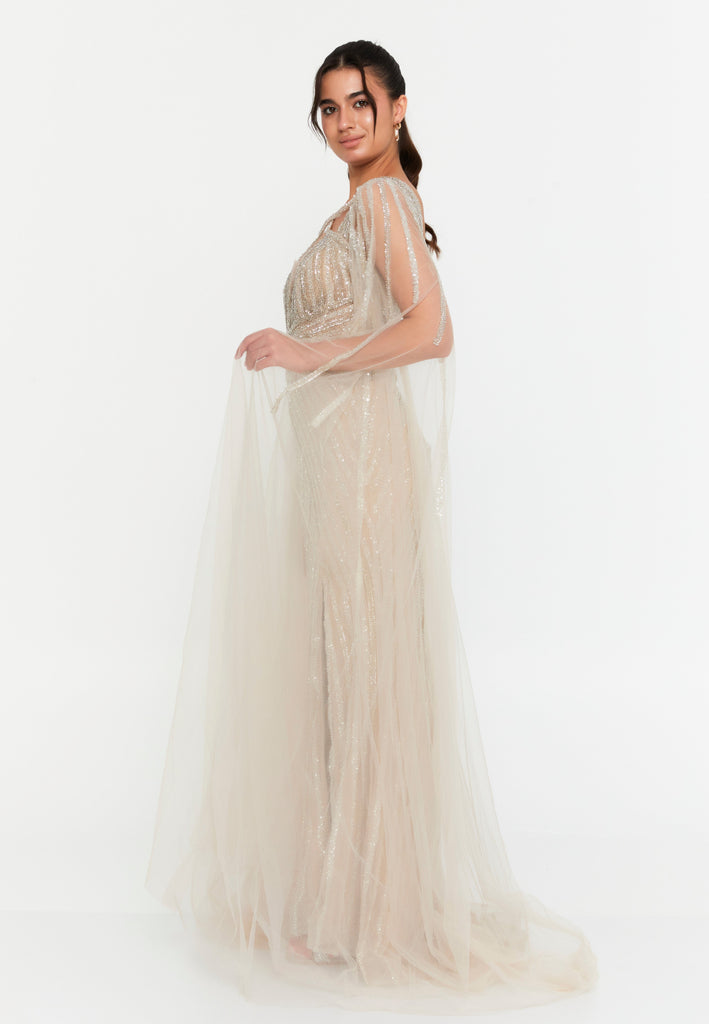 Celestial Beaded Cape-Sleeve Gown – Crisscross Neckline, Off-Shoulder Bodice, Front Slit & Flowing Tulle Trains